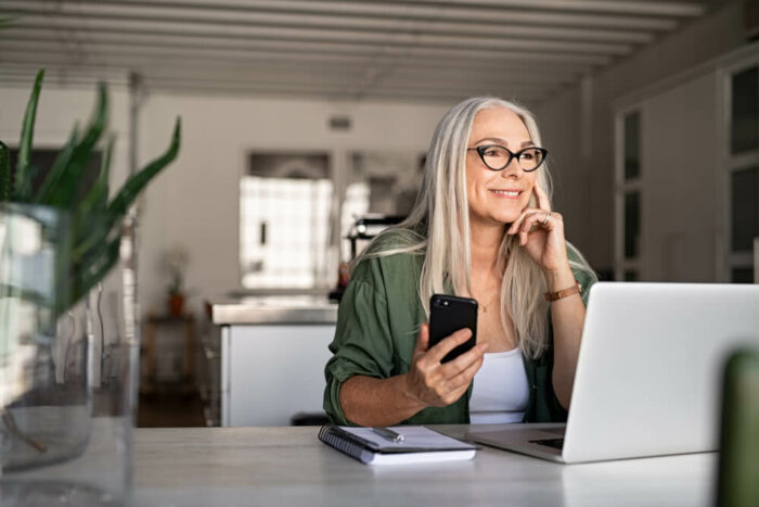 Woman researching eye care on her smart phone