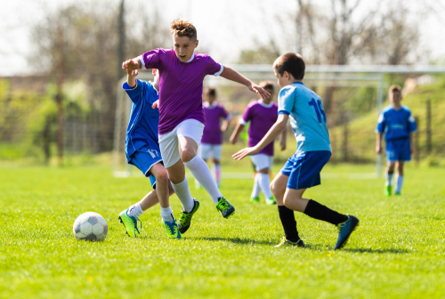 Children playing soccer