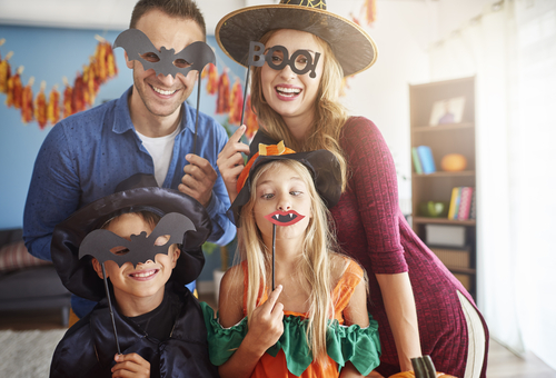 family celebrating halloween 