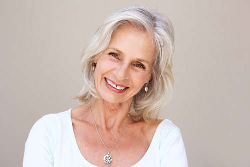 Older woman smiling after cataract surgery