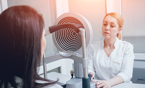 Woman taking an eye exam